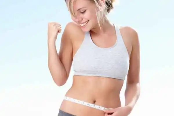 woman happy after fat reduction treatment Beckton
