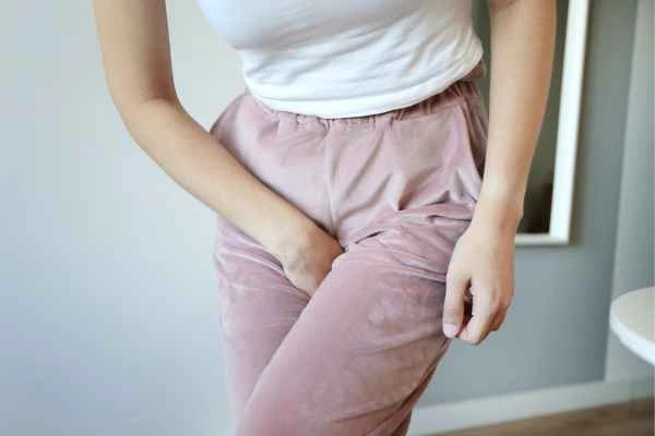 woman struggling with urine incontinence Beckton